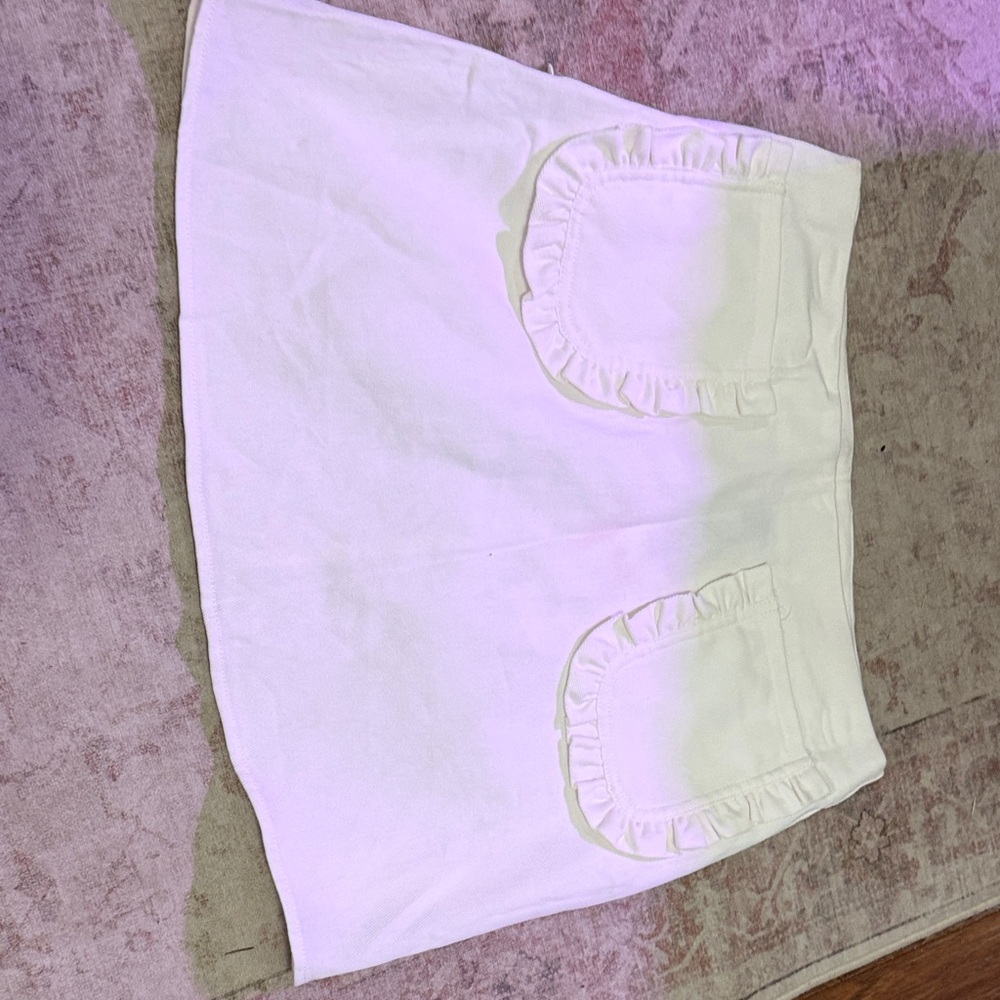 Cider White Mini Skirt with Ruffle Pockets